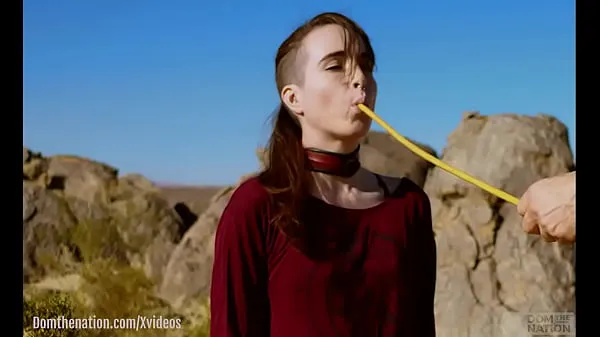 Fresh Petite, hardcore submissive masochist Brooke Johnson drinks piss, gets a hard caning, and get a severe facesitting rimjob session on the desert rocks of Joshua Tree in this Domthenation documentary top Movies